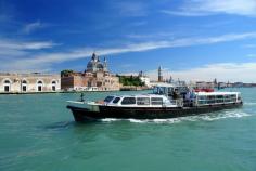 Motor-boat and view of The Doge's Palace, Venice. Italy.