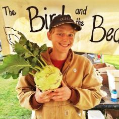 One our #localfood #youngagrarians with a giant #kohlrabi ... The Birds and the Beans Farm, Comox Valley
