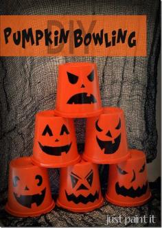 DIY Pumpkin Bowling - make this fun game with plastic tubs, spray paint and a Sharpie!