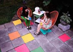 
                        
                            Use latex floor paint to color cement tiles on an outdoor patio. | 51 Budget Backyard DIYs That Are Borderline Genius
                        
                    