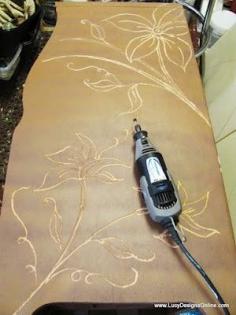 
                    
                        Using A Dremel To Carve Designs Into Wooden Furniture That Is Already Scuffed Or Damaged That You Find For Cheap At Thrift Or Yard Sale! Imagine If You Burned Inside The Cuts?! Then Finished It?!  Could Be Really Cool!!!
                    
                