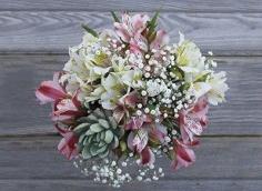 
                    
                        This succulent bouquet is so full of character, it's impossible not to love!
                    
                