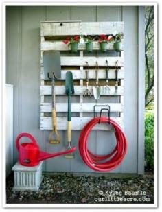 
                    
                        Such a neat (and don’t forget cheap) way to organize the garden tools. Pallets are so universal!
                    
                