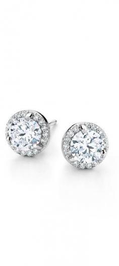 
                    
                        These halo diamond earrings are perfect for an elegant summer look.
                    
                