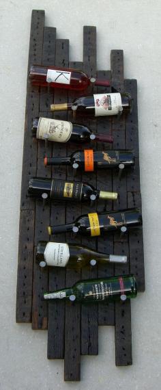 
                    
                        Reclaimed wood wine rack rustic wine rack to going to get my fella to make one for our home!
                    
                