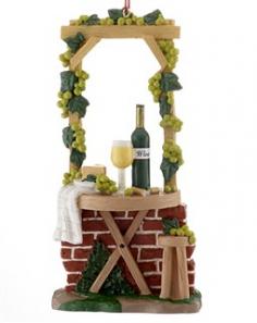 The table has been set to enjoy a bottle of Chardonnay or Sauvignon blanc paired with some cheese. A beautiful trellis decorated with green grapes and ivy leaves, provides a little shade for the wine tasting table. A glass of white wine has been poured and is ready to be shared with friends. Let this personalized ornament commemorate a trip to Sonoma or Napa where a wonderful time was spent wine tasting at the beautiful wineries. A wine connoisseur would love to hang this on their Christmas tree this year!
