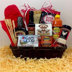 Web exclusive! This basket is the perfect gift for any grill master. This multi-piece Fifth Avenue Gourmet Ultimate BBQ Gift Basket is a wonderfully thoughtful gift sure to be appreciated. Filled with a versatile assortment of sauces, seasoning, skewers, beans and much more, this gift basket is certain to be a hit this holiday season. Multicolor Includes: 10oz Steak Sauce, 18oz Original BBQ Sauce, Louisiana Supreme Chicken Wing Sauce, Mill Farm Chicken Seasoning, 6 Wooden Skewers, BBQ Basting Brush, Grilling Mitt, 8.3oz Bush's Original Baked Beans, 4oz Beer Nuts, 2.5oz of Brent and Sam's Chocolate Chip Cookies, and 4.2oz of Aunt Gloria's Sugar Cookies Imported