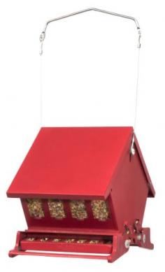 The Mini Absolute 2 Feeder features a spring operated perch with an adjustable weight setting that allows you to close access to the available seed preventing "bully" birds and other animals from plundering the feeder. Double-sided so lots of little birds can feed; multiple windows allow you to see when your feeder needs a refill. Powder coated steel feeder includes hanger. Holds up to 4 lb. of seed.