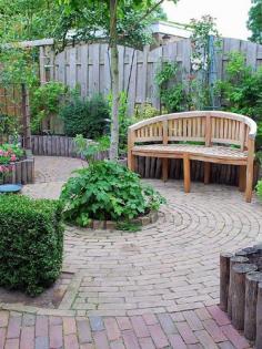 Circular or winding patio shapes are inherently attractive, so you won’t have to add much in the way of furniture or decor.