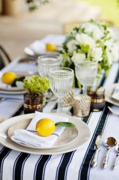 Preppy summertime tablescape with pops of yellow.   Photography: Angie Silvy Photography - angiesilvyphotogr...