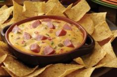 HAPPY CINCO DE MAYO ... Rich N Cheesy Smoked Sausage Cheese Dip Recipe ~ INGREDIENTS: Eckrich® Skinless Smoked Sausage or use Eckrich® Turkey Smoked Sausage for a lighter option - Cheese - Diced tomatoes with green chili peppers - Ground cumin - Sour cream  - Cilantro - Pita chips or Bagel chips