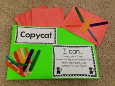 "Copycat" center.  Glue popsicle/craft sticks to laminated pieces of construction paper in various shapes and figures.  Have students "copy" what they see.  Then kiddos can create their own!