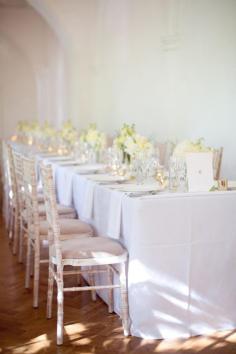an elegant summer tablescape filled with shades of yellow and neutrals Photography: Caught The Light - caughtthelight.com  Read More: www.stylemepretty...