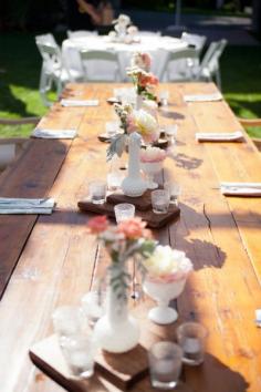 Family-style seating and antique hobnail vases.   Photography: Hannah D Photography  - www.hannahnielsen...