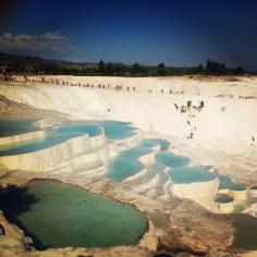 Stunning Pamukkale travertine pools. Go about 3pm and stay until sunset so you take advantage of the best light for photos and miss the hottest part of the day. Visit Hierapolis first or you may be so entranced by the pools you might not make it back up the hill to look at the magnificent ruins. Soak in the fabulous man-made pools cascading down the hill to cool off while admiring the original travertines. Discovered by AbbyL at Pamukkale, Denizli, #Turkey