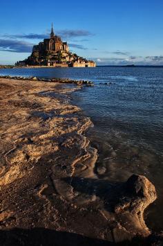 Such a pretty view of the beach and the castle in the distance. "Sunrise at Mont Saint-Michel, Normandy, France"