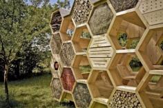 The K-abeilles Hotel for Bees is more than just an intriguing pavilion built for the 2012 Muttersholtz Archi Festival in in France. The giant honeycomb wall is an attractive retreat for wild bees who like to burrow into the tight spaces. Designed by AtelierD, the pavilion features a honeycomb installation on one side that is perfect for bees, while the other side offers a shady resting spot for humans built with the same honeycomb panels.