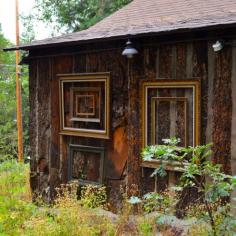 Antique frames on the outside of the  barn