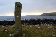 Island of South Ronaldsay - This large stone, thought to be an old standing stone. Three local men decided to move and re-erect the stone as their own Millennium project.