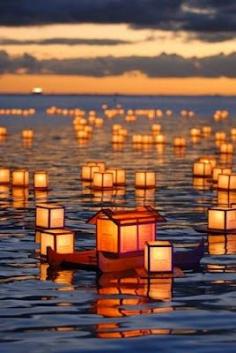 Toro Nagashi is a Japanese ceremony in which participants float paper lanterns (chōchin) down a river