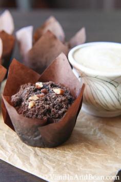 Deep dark double chocolate muffins with zucchini and chocolate pecan streusel will help you get out of bed a little quicker in the morning.