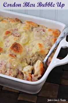Cordon Bleu Bubble Up ~ Comforting casserole full of biscuits, Alfredo sauce, chicken, ham and swiss cheese!