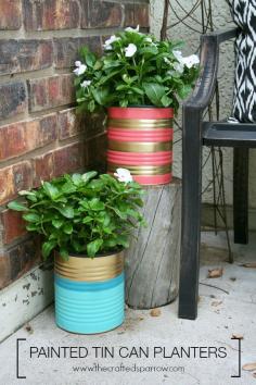 Recycle old tin cans into fabulous painted tin can planters, perfect for indoors or outdoors. A great way to stay in budget and add color to your space.