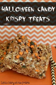 Are you always looking for ways to get rid of all that leftover Halloween candy? Sticking them in Halloween Crispy Treats is the perfect thing! Caution: These are highly addictive! | Little Dairy on the Prairie