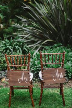 reception chair backs, photo by Allie Lindsey Photography ruffledblog.com/... #weddingideas #woodsigns