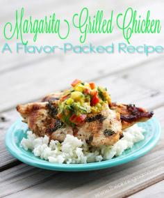 My favorite grilling recipe... ever period.  Margarita grilled chicken with avocado mango salsa served on a bed of cilantro lime rice.  HEAVEN!