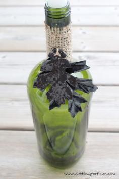 DIY Wine Bottle Candle Holder with Metallic Accents from Setting for Four #DIY #Candle #Wine #Bottle #Autumn Decor