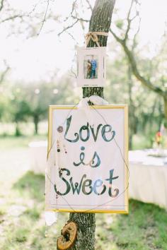 love is sweet, photo by Mint Photography ruffledblog.com/... #weddingsigns #signage