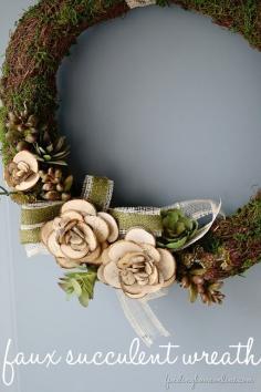 Wood Slice Faux Succulent Wreath... perfect for the holidays or anytime!   www.findinghomeon...