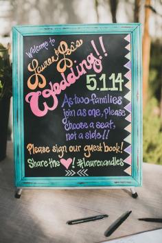 colorful chalkboard sign, photo by Studio Castillero ruffledblog.com/... #weddingideas #weddingsign #guestbook