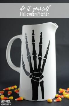How to make this fun Halloween skeleton hand pitcher.  Using cut out vinyl you can create this in minutes! HandmadeintheHear...