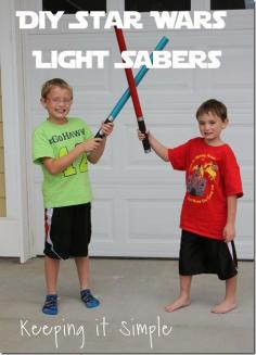 DIY Star Wars Light Saber using wrapping paper tube.  These would be perfect for costumes or birthday party!  #StarWars #SparkRebellion #boys @Keeping It Simple