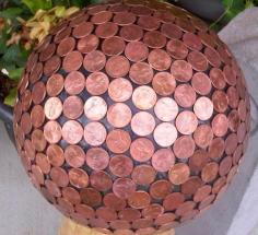 
                        
                            Bowling ball yard art made with pennies - via houseofhawthornes...
                        
                    