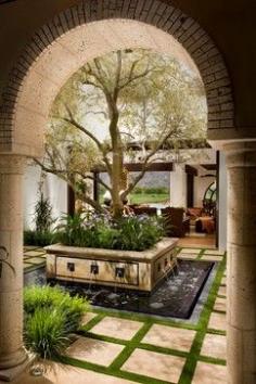 A Spanish Revival/ Spanish Colonial mediterranean-patio