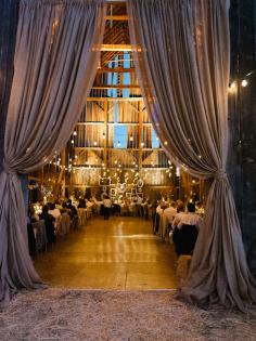 
                        
                            barn wedding, curtains, strung lights, candles, burlap, frames, antlers
                        
                    