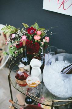 pretty little bar with ice in a simple glass fishbowl