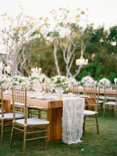 
                    
                        Beautiful wooden tables and white flowers: www.stylemepretty... | Photography: Angga Permana - anggapermanaphoto...
                    
                