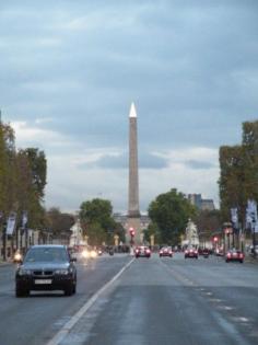 
                    
                        A 75-foot monumental pillar fashioned from pink granite, the Obelisk of Luxor looms over Place de la Concorde,
                    
                