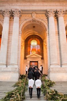 
                    
                        Lush hydrangea staircase decorations at the New York Public Library | @Ira Lippke | Brides.com
                    
                