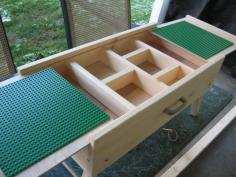 
                    
                        This is a Lego Table that has a sliding top to expose a storage area.  The legs fold under and has a handle for carrying.  Solis Pine with plywood top and base.
                    
                