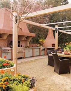 
                    
                        Tour this earthy outdoor kitchen in Calistoga, Napa complete with a professional grilling area.
                    
                