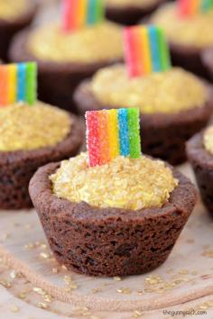 
                    
                        These Pot of Gold Cookie Cups have Rolos stuffed inside and a rainbow on top! Try this recipe for St. Patrick's Day.
                    
                