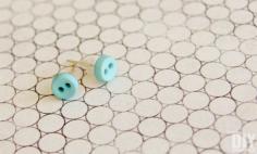 
                    
                        DIY Button Earrings. These earrings are cute as a button and so easy to make!
                    
                