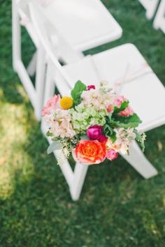 
                    
                        Aisle flowers: www.stylemepretty... | Photography: Onelove - www.onelove-photo...
                    
                