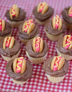 
                    
                        Mini Hot Dog Cupcakes - yellow cupcakes are topped with chocolate frosting and then decorated with a hot dog!  Perfect for Memorial Day! | ChezCateyLou.com
                    
                