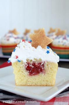 
                    
                        Vanilla Cherry Pie Cupcakes - homemade vanilla cupcakes filled with a hidden pocket of cherry pie filling
                    
                